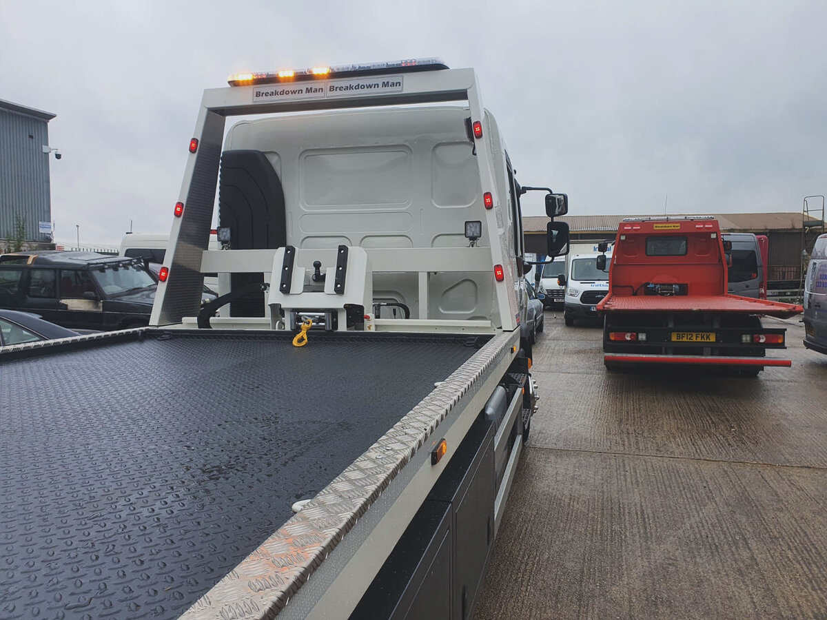 Rear view of the branded Breakdown Man recovery truck parked at the Wigan depot.